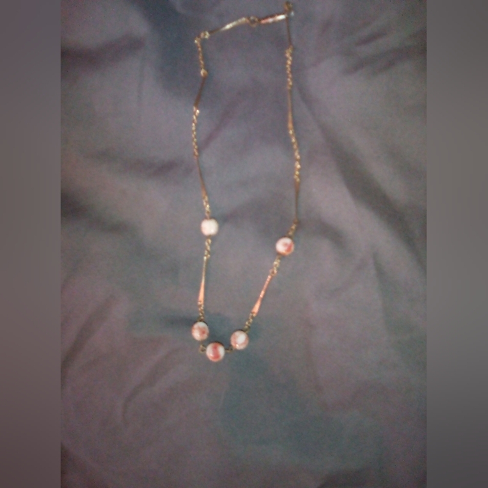 Elegant Gold and Pearl Necklace